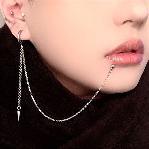 ear lip chain|lip ring connected chain earring.